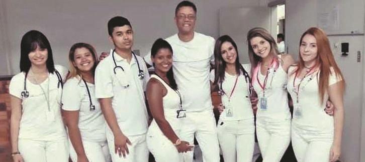 No primeiro estágio, com o professor Márcio Diniz, no Alpheu de Quadros (arquivo pessoal).